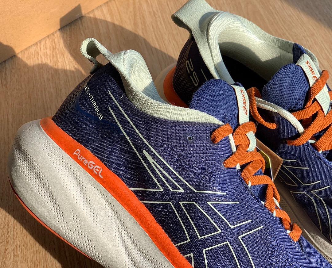 Asics Gel - Nimbus™ 25 Azul Marinho com Laranja e Branco